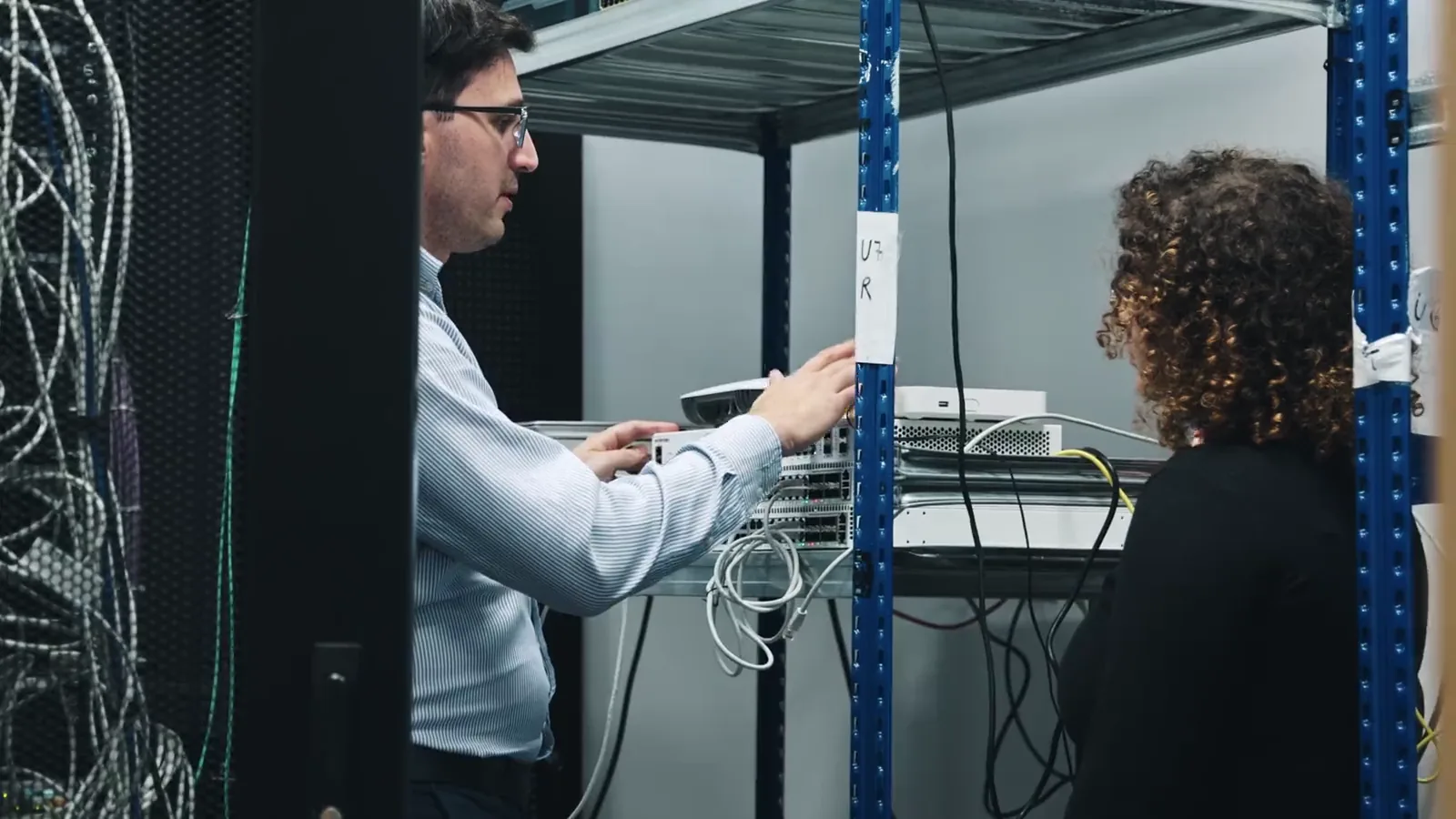 ICT Solutions engineers configuring networking equipment in Malta.